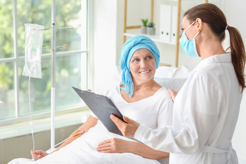 Healthcare provider consulting with a patient during a visit.